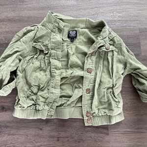 Cropped military shrug